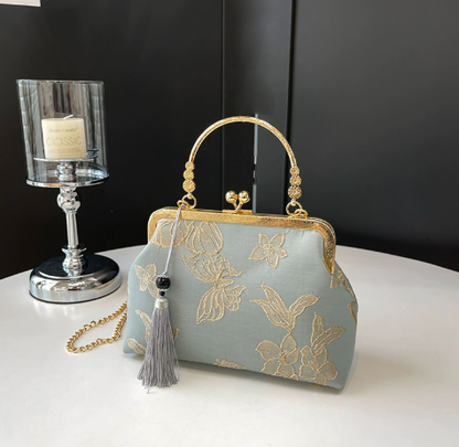 Dié Yùn · Oriental Elegance Metal-Frame Clutch Bag